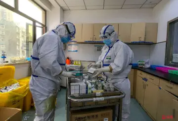 读特记者直击武汉战疫 | 广东医疗队医生：“在病区内，我们都是多面手”