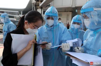所有入境旅客一个都不漏！记者穿防护服目击深圳机场检疫流程